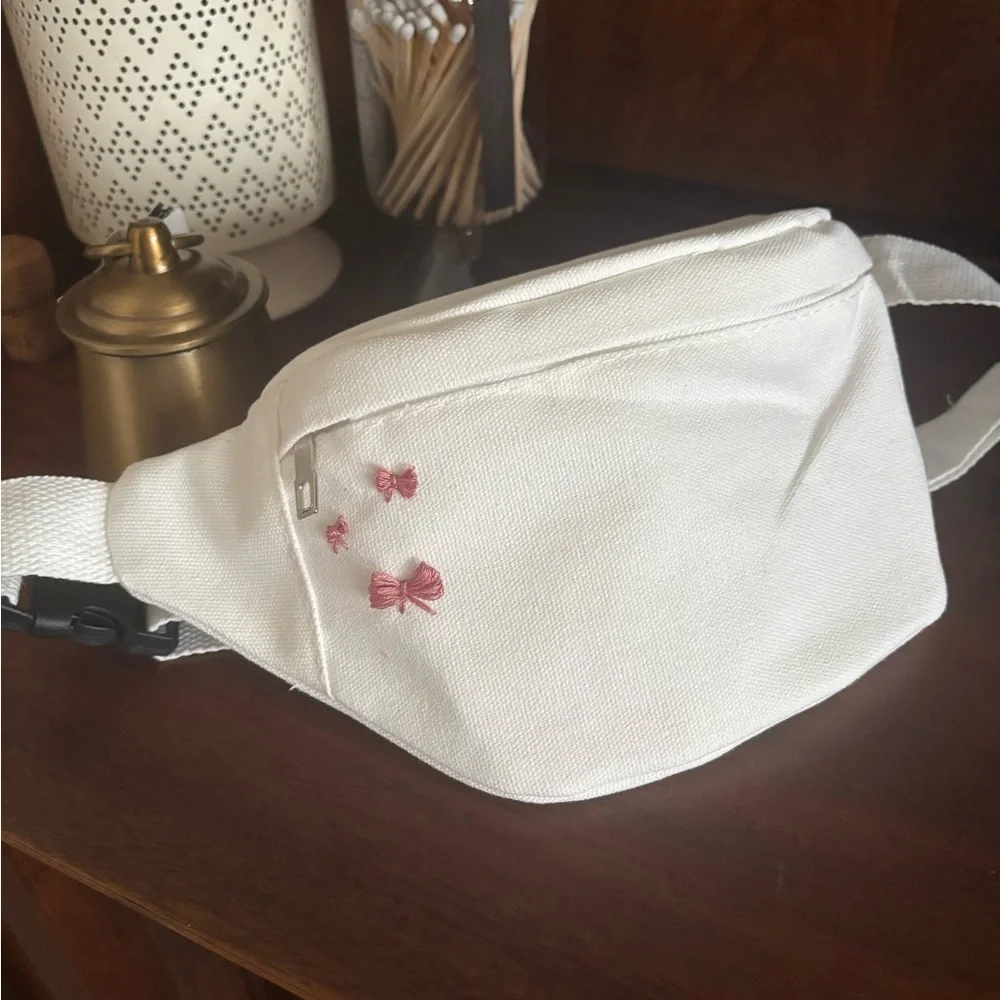 White Belt Bag with Hand Embroidered Pink Bow Accents - Picture 1 of 3